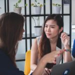 Women talking about a book proposal